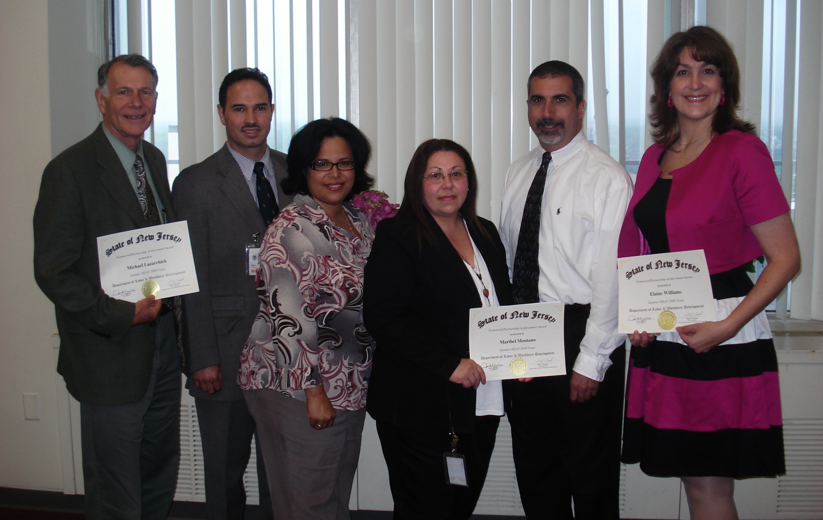 Receiving Teamwork/Partnership Achievement Award from State of New Jersey